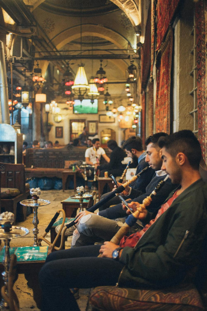Guests enjoying shisha at a traditional lounge in Dubai